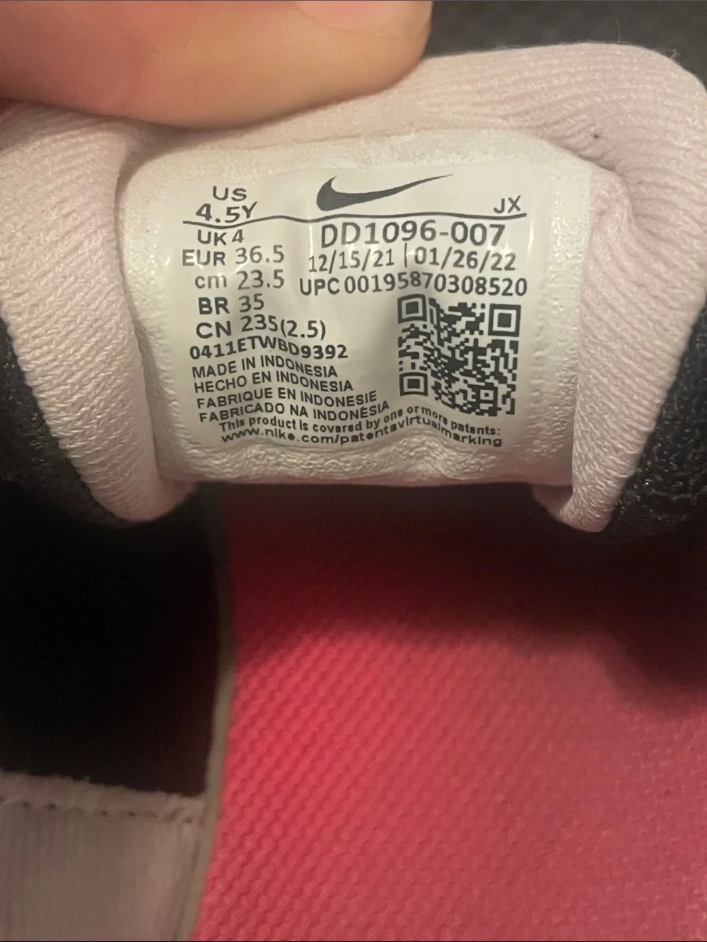 Nike Black Sneakers with Pink Swoosh Accents